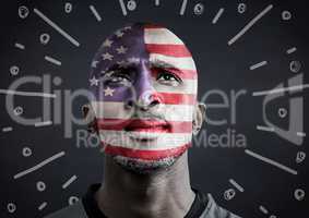 Portraiture of man with american flag face paint against navy chalkboard and white fireworks doodle