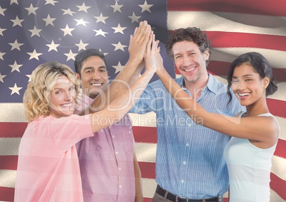 ASmiling Friends with hands together against american flag