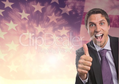 happy business man with thumb up against american flag