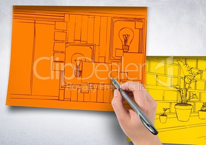 hand drawing office red lines on orange paper stick on the wall. 1 blueprint more in yellow papers,