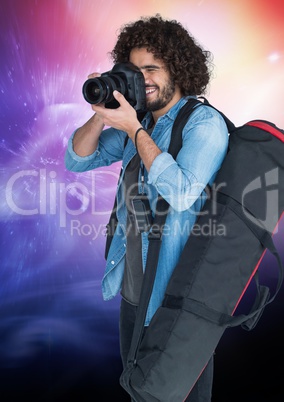 Photographer taking picture against galaxy background