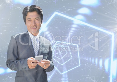 Smiling businessman texting against interface