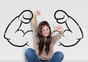happy young woman with hands up setting the back on fists draw on a wall