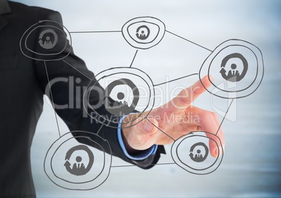 Business man mid section pointing at 3D grey network doodle against blurry blue wood panel