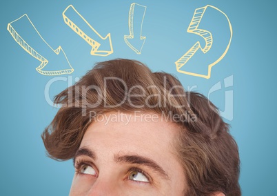 Top of man's head looking at yellow arrows against blue background