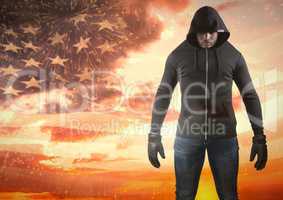 Man with covered face  against american flag