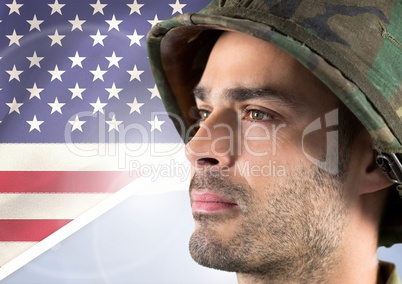 Close-up of a soldier looking horizon against american flag background