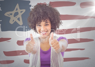 Woman giving two thumbs up against hand drawn american flag and white wall with flare