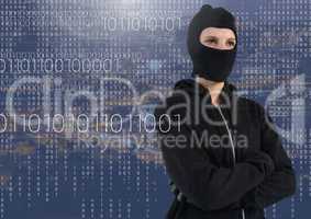 Woman hacker with hood standing on in front of blue digital background