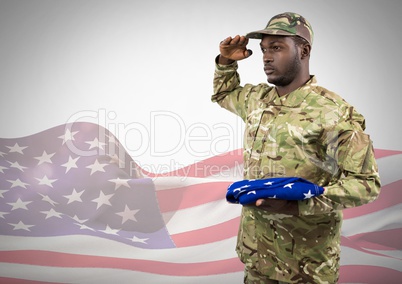 Black soldier holding an american flag for independence day against a 3d american flag