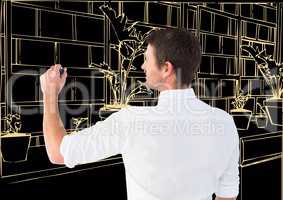 man drawing 3D office light lines in dark background
