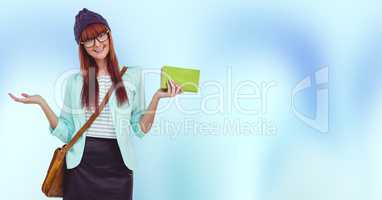 College student with green book against blue background