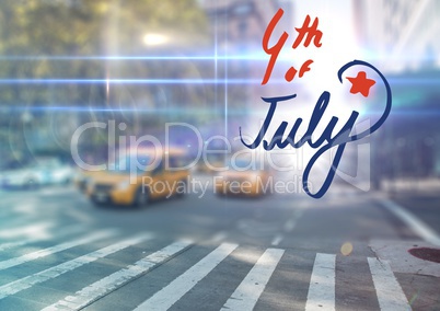 Fourth of July graphic against blurry street scene with flares