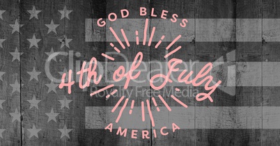 Pink fourth of July graphic against grey american flag on wood panel