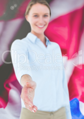 Business woman shaking her hand against flag