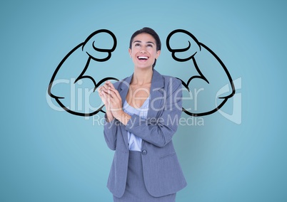 happy businesswoman in front of fists draw on blue wall