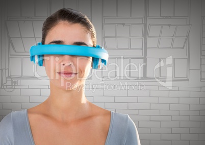 Woman in blue virtual reality headset against grey hand drawn windows
