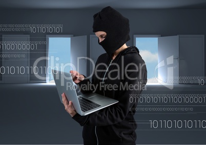 Hacker using a laptop in room with open doors