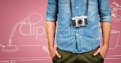 Millennial man with camera mid section against pink and white hand drawn office