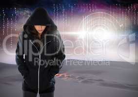 Woman hacker hooded standing on in front of digital background