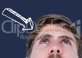 Top of man's head looking up with white downward 3D arrow against navy background