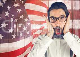 Crazy hipster standing on an american flag background