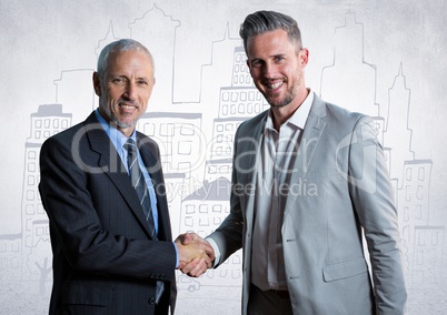 Business men shaking hands against white wall with city doodle