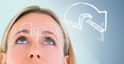 Top of woman's head looking at 3D white downward arrow against blue background