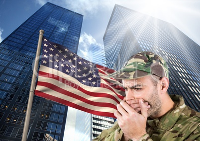 military covering his mouth against american flag and skyscrappers