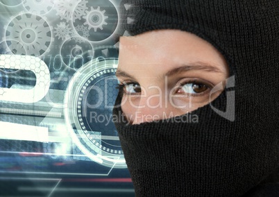 Woman hacker wearing an hood in front of digital background