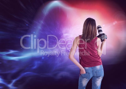 Photograph holding camera against colorful background