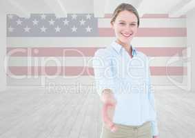 business woman shaking her hand against american flag