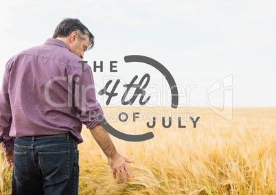 Grey fourth of July graphic against man touching grain
