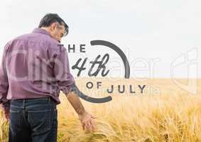 Grey fourth of July graphic against man touching grain