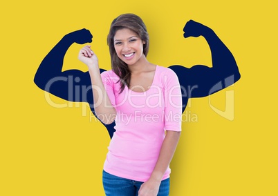 happy young woman in front of fists dark blue draw on yellow wall
