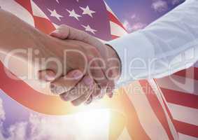 Handshake against american flag background