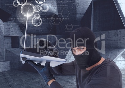 hacker using a laptop in a minimalist room