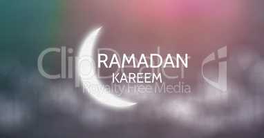 White ramadan graphic against blurry green purple background