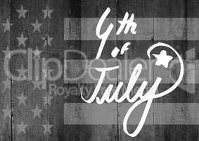 White fourth of July graphic against grey american flag on wood panel