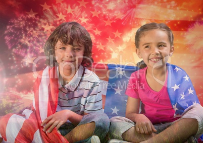 Children seated covered by american flag
