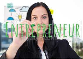 Young businesswoman writing ENTREPRENEUR on the screeem