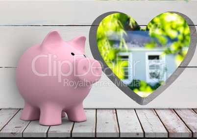 pink piggy bank in front of wood wall with heart hole where we can see a house (blurred)