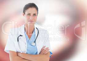 Female doctor arms folded against red and white abstract background