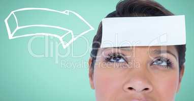 Woman with 3d white arrow pointing to card on head against aqua background