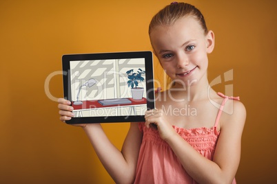 Smiling girl showing a colored drawing on her digital tablet
