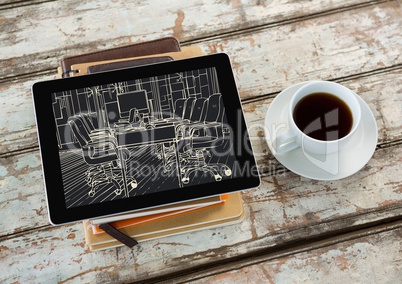 tablet on top of books and coffee on a desk. In the tablet new office design lines (negative color)