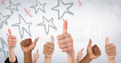 Hands giving thumbs up against white wall with red and blue hand drawn star pattern