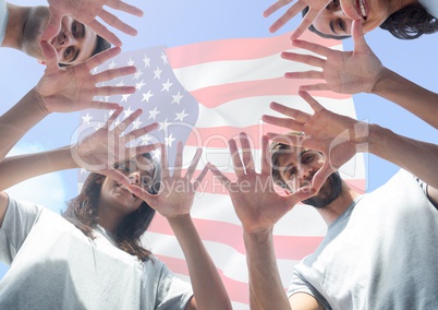 Happy friends with their face between hands for independence day