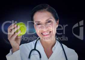 Female doctor with 3d apple against blue flare
