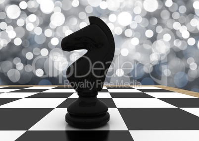 3d Chess piece against silver bokeh